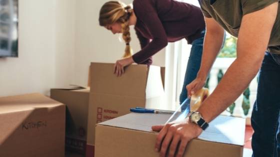 If selling a home wasn't stressful enough, you may have to pack up all your belongings as you try to sell. Here are some tips to make the process more seamless.